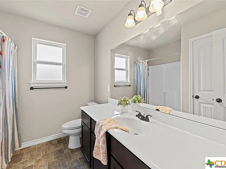 Spare Bathroom 1 (flooring in photo is old)