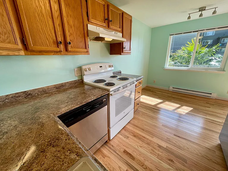 Kitchen, and dining area with view to gardens