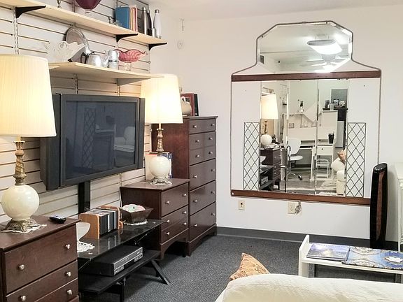 Furnishings & Fixtures NOT INCLUDED. Pictures show how nicely one of our tenants decorated the living area and made great use of the Studio Apartment.
