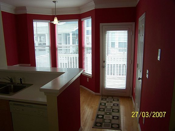 Charming Dining Room with entry to private deck.