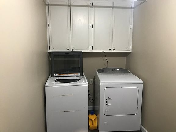 Laundry room off carport. 