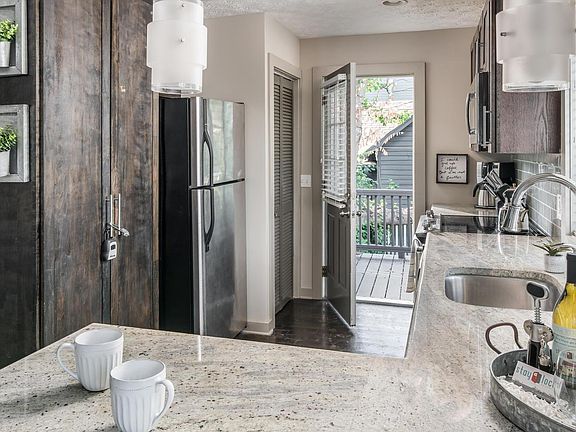 From your kitchen, there is access to a small balcony.