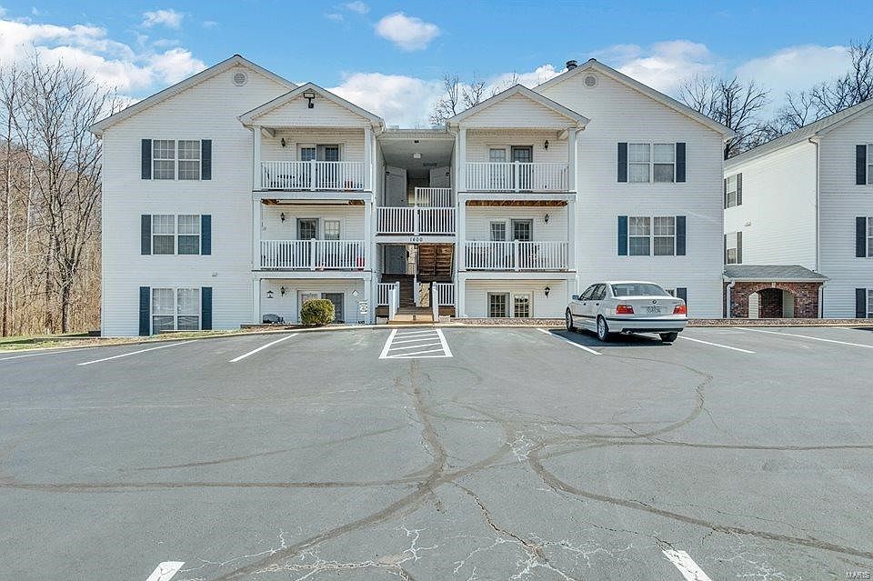 Exterior. Unit is located on the right and is easily accessible on the main level.