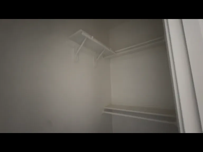 HIS/HER CLOSET TWO OF THE SAME ON EACH SIDE