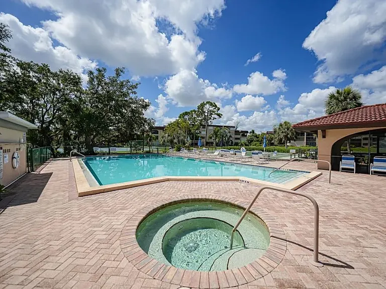 Large pool, hot tub, clubhouse with changing/shower rooms, BBQ grills, shuffle board.