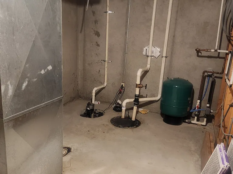 unfinished mechanical room in basement