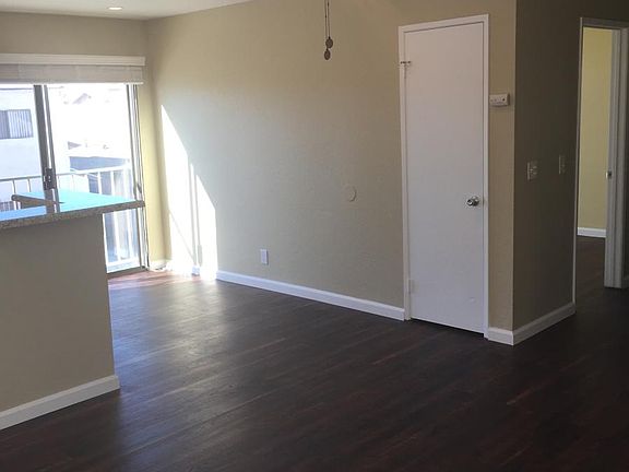 Beautiful spacious living room with candelabra ceiling fan