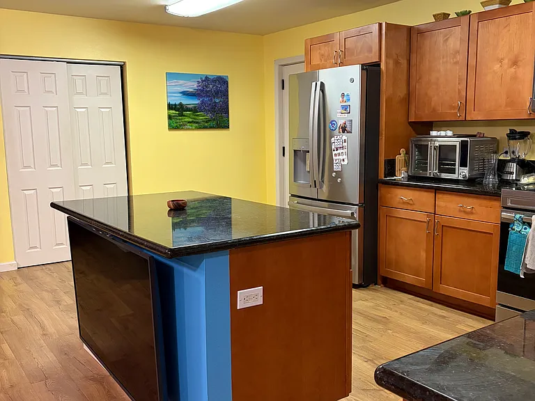 Spacious kitchen with plenty of counter space and cabinets