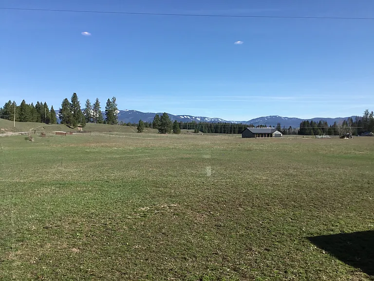 Enjoy breathtaking mountain and open pasture views from the home, where Montana's peaceful big-sky scenery creates the perfect backdrop for quiet mornings and relaxing evenings.