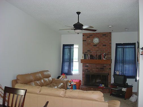 Wood burning fireplace & updated ceiling fan