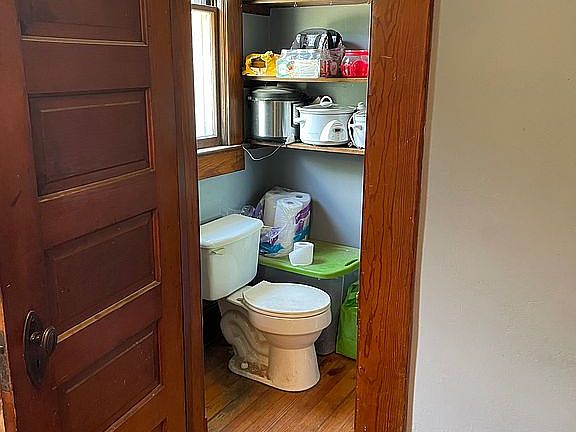 Half bathroom off of kitchen