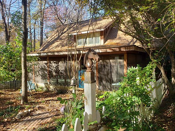 South facing porch allows for dappled sunlight and great conversation area.