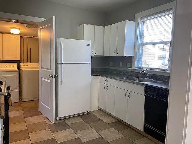 kitchen open to utility room