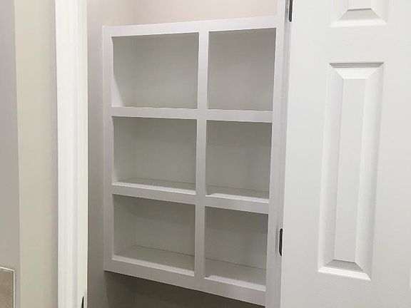 Large walk in pantry with light