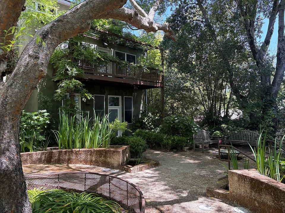 Walking through gardens to rental, which is the most private in complex.