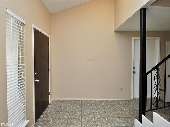 RAISED ENTRY. (AFTER PHOTO WAS TAKEN THE SELLER CONTINUED TO IMPROVE AND ADDED AN ENTRY CHANDELIER.