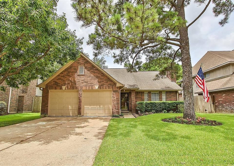 Welcome home to 16825 Kettle Creek Drive located on a quiet street in Champion Woods zoned to Klein ISD! This stunning home has lovely curb appeal, a well-manicured lawn, beautiful landscaping, brick elevation, covered front porch, and a double wide 