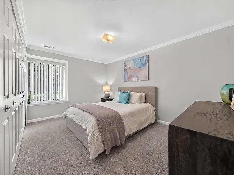 Spacious Bedroom at Lakeside Village Apartments in Clinton Township, MI.