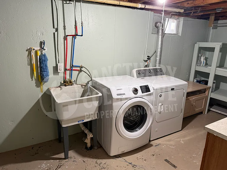 Laundry area in basement