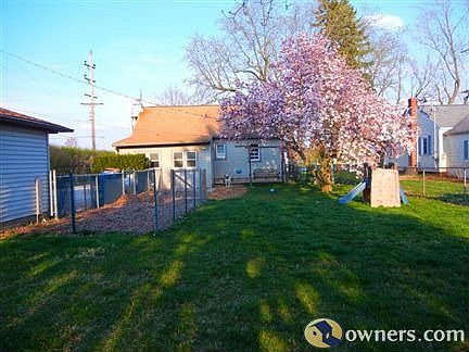 Part of the backyard. It is completely fenced in.