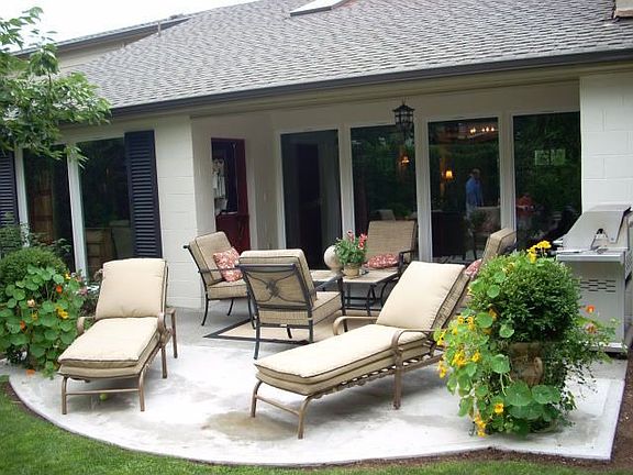 back patio with outdoor fireplace
