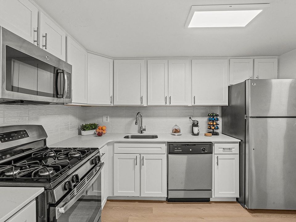 kitchen with white cabinets and stainless steel appliances
