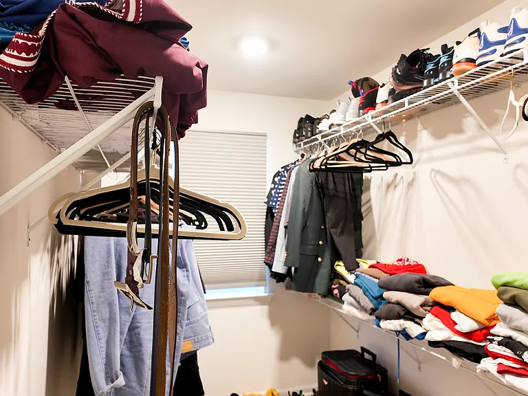 large walk in closet--(clothes not staying)
