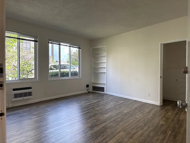 Sunny and spacious front room gets sun all day