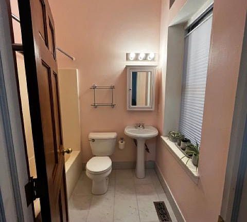 Bathroom 1 - full bath with tile floors, Signature hardware fixtures
