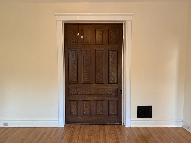 Living Room looking toward middle bedroom pocket door