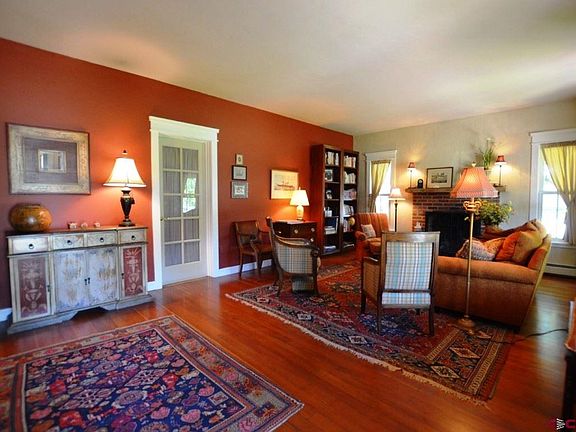 Hardwood floors and and accented walls bring mountain charm to the living area.