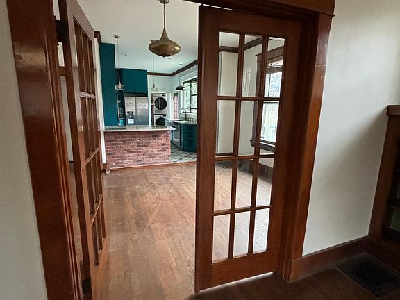 French Doors from living to open dining/kitchen