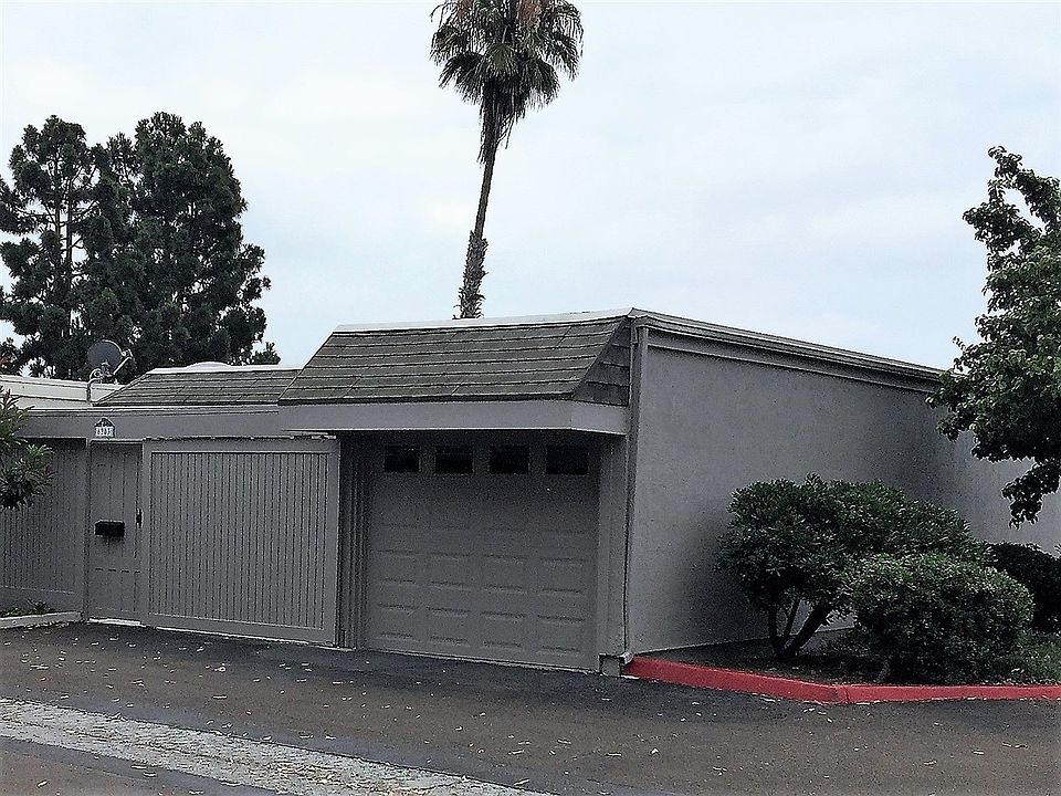 Front entry patio area, or can be used as additional parking area.  Entry through sliding barn door adjacent to the one car garage with new roll up garage door.