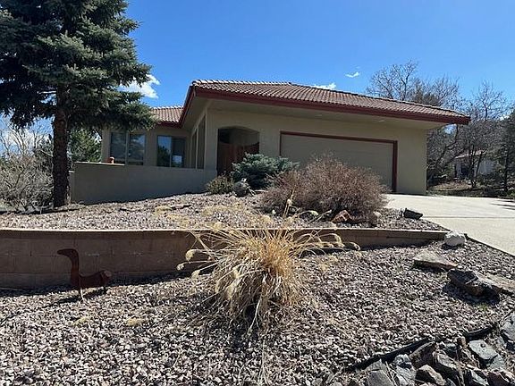 Front entry and 2 car oversized garage.