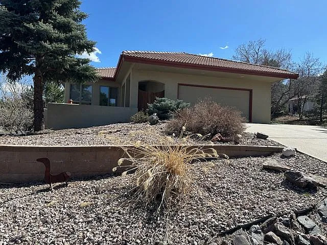Front entry and 2 car oversized garage.