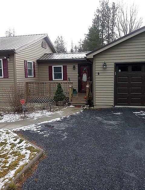 House Khaki color w maroon shutters