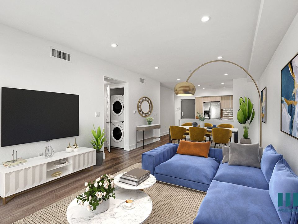 Open-Concept Kitchen, Dining, and Living Room s with In-Suite Washer & Dryer