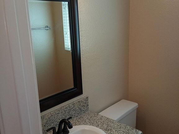 Downstairs Bathroom-refinished cabinetry