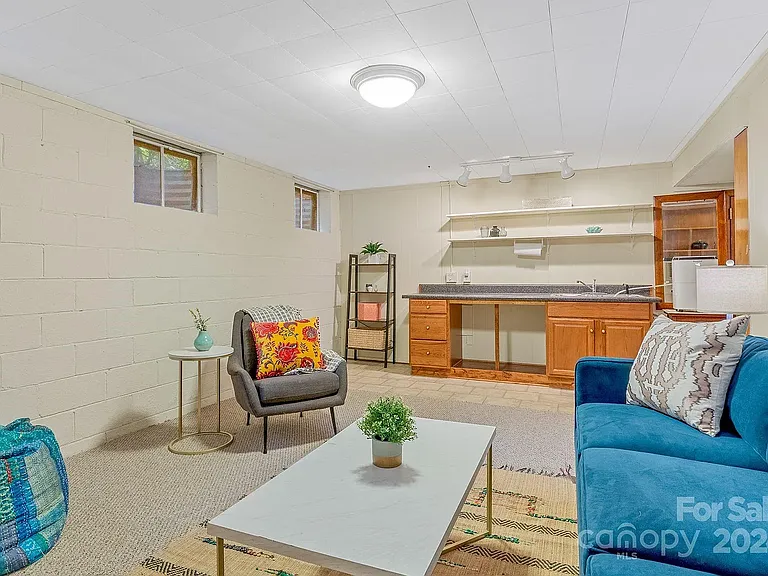 Recreation room has sink and set-up for efficiency Kitchen