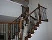 Staircase with wrought iron spindles