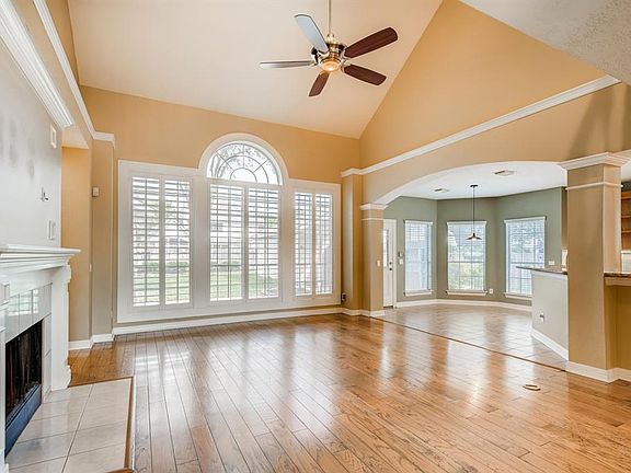 A view of the family room that showcases the wonderful open floor plan to the kitchen and breakfast area.