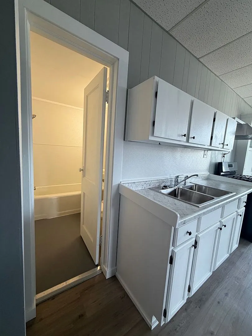 Historic Charm. Modern Comfort: Bright Spaces Updated Finishes Walkable Location — Photo 4
