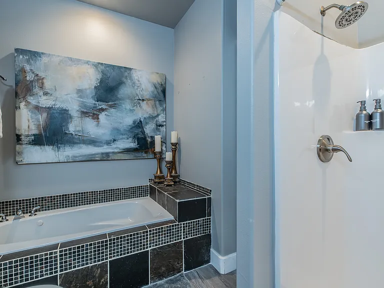 Enjoy the best of both worlds with a soaking tub and a walk-in shower.