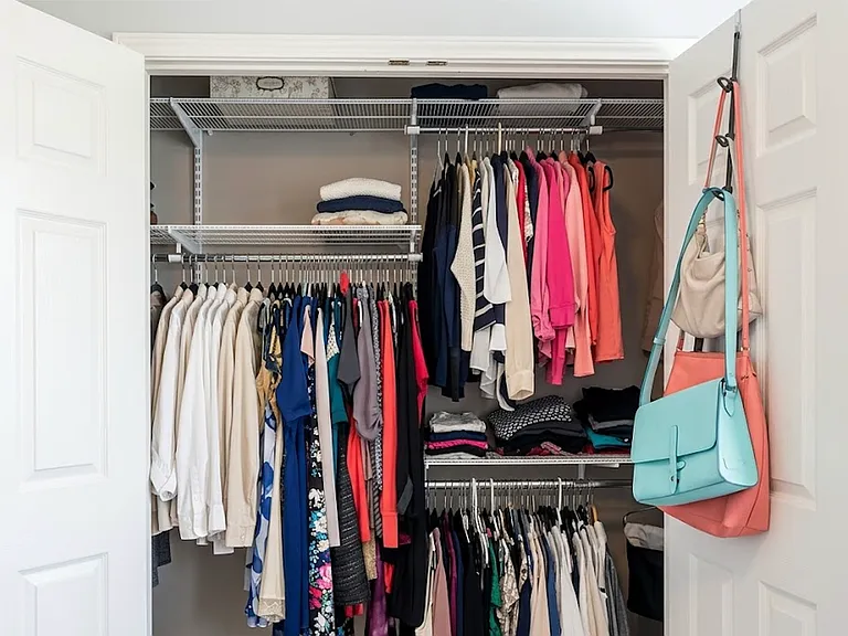 Double door closed in secondary bedroom with Container Store Storage system.