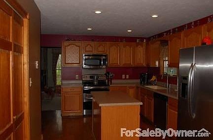 Kitchen
						:
						Oak cabinets, solid surface countertops, stainless range and dishwasher