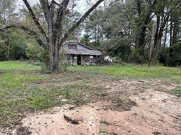 Behind barn structure 