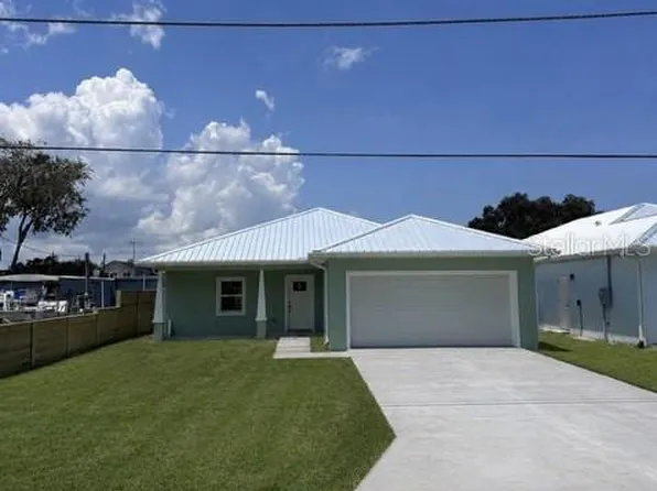 124 INDIAN CREEK ROAD, OAK HILL, FL 32759