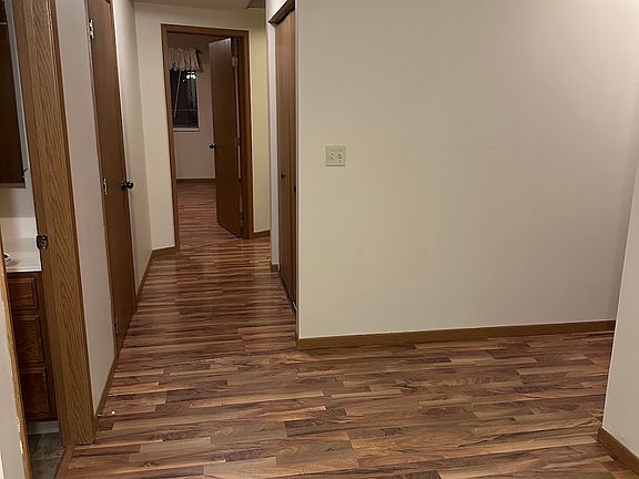 From the entry area--bathroom and storage closet on the left. Master bedroom straight ahead. Laundry and closet on the right in the hallway and hallway on the right to go to the dining room, living room, and kitchen.