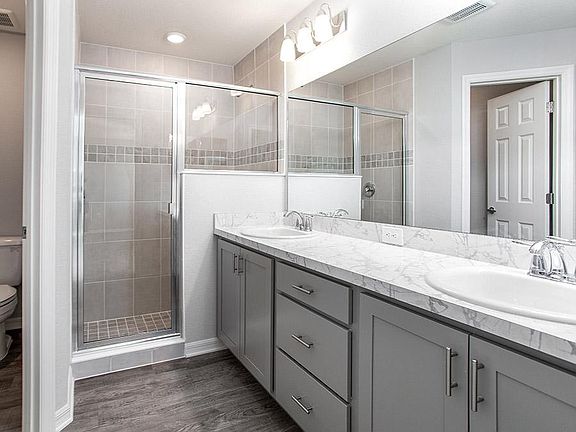 Spacious, private en-suite owner s bath - New home for sale in Eagle Lake, FL - Photo showcases a ho