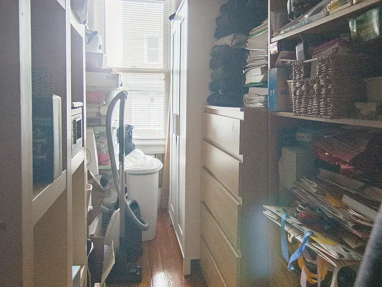 Currently storage, could also be used as an office if bookshelves are removed